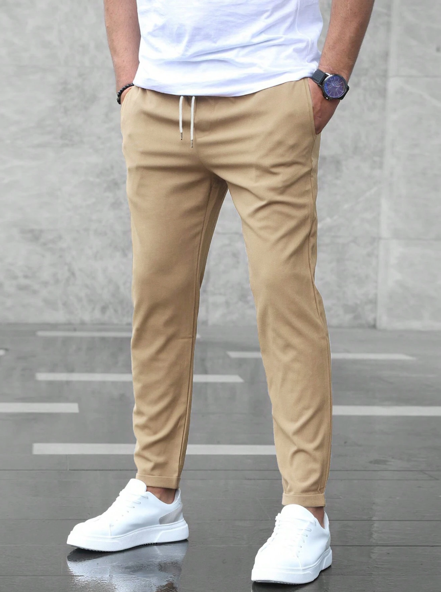 Everyday comfortable men's slim-fit stretch pants, a modern and versatile wardrobe essential.