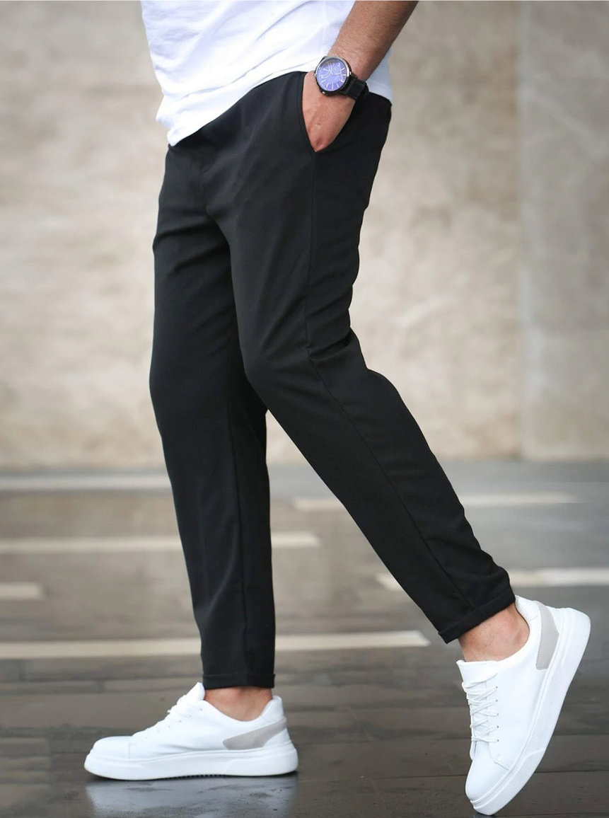 Modern men's fashion: slim-fit stretch trousers ensuring all-day comfort and sleek style.