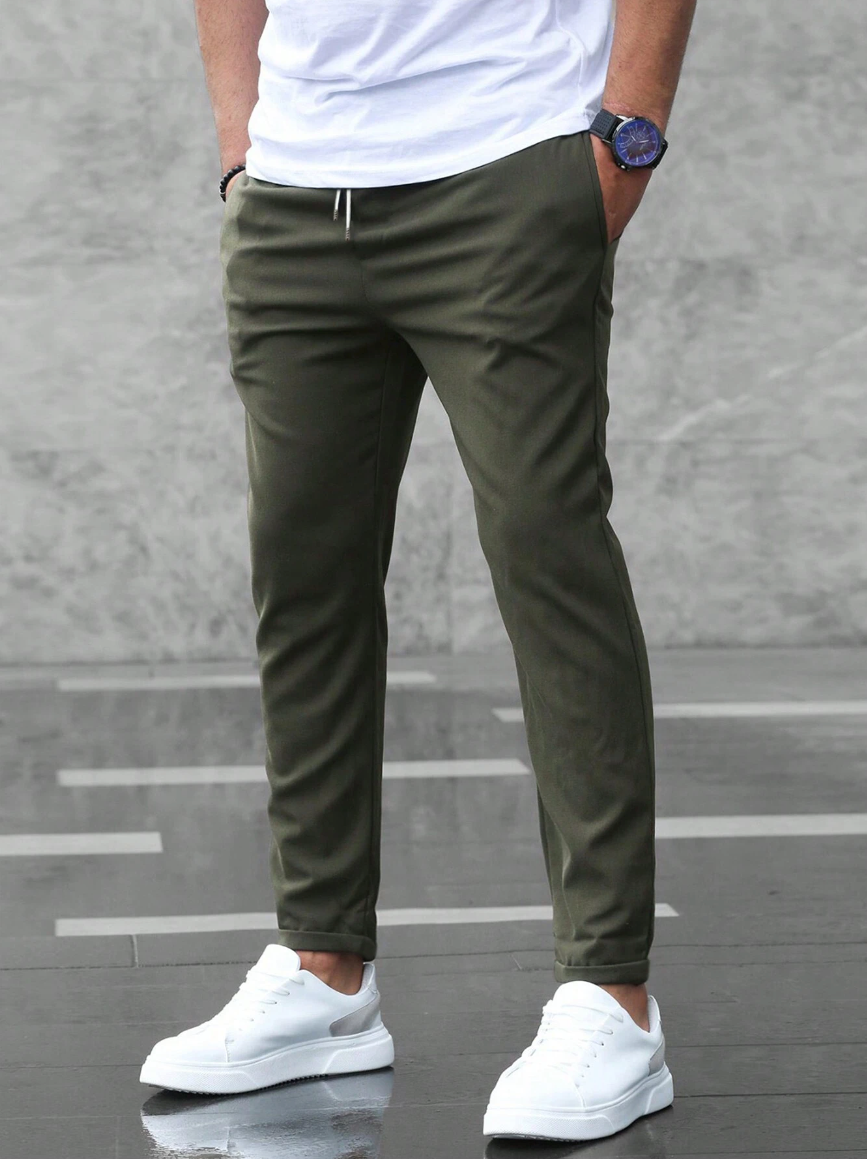 Casual men's comfortable slim-fit stretch trousers, perfect for versatile, modern styling.