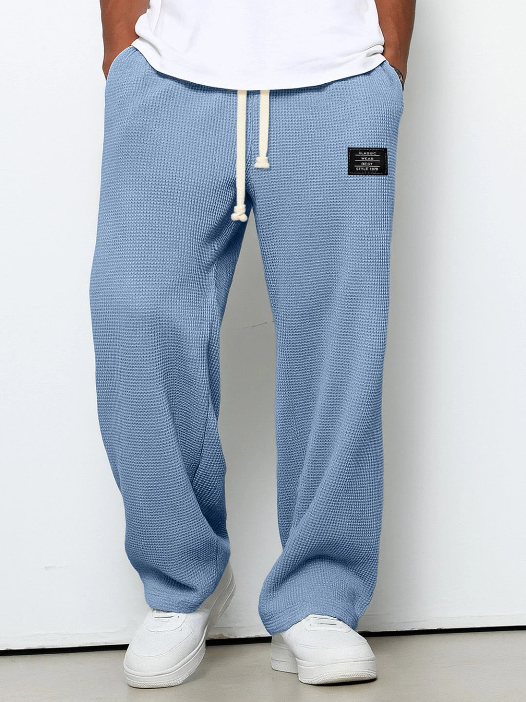Soft, comfortable men's sweatpants in a relaxed fit, ideal for lounging and active casual wear.