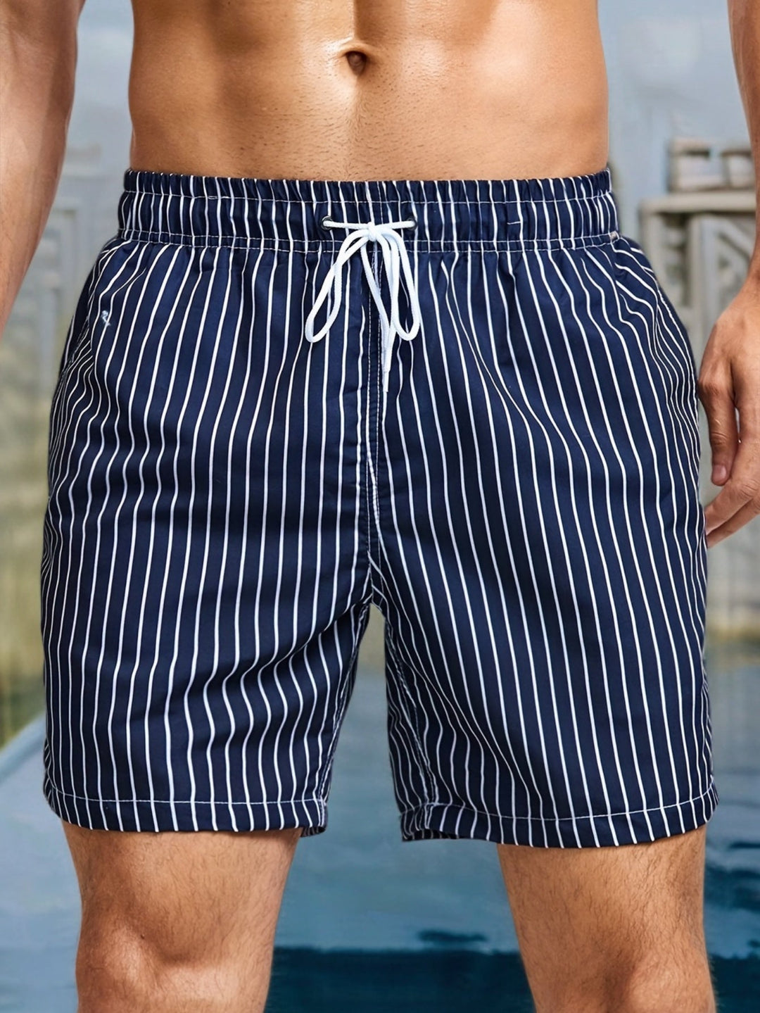 Men's striped swim shorts with adjustable drawstring waist, ideal for beach & pool activities.