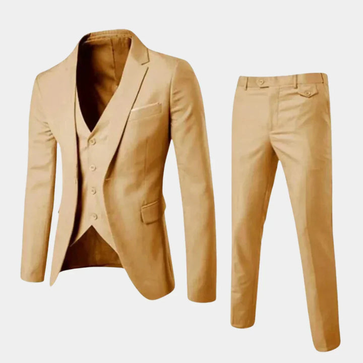 Close-up of a men's slim fit tailored suit, showcasing the precise cut of the blazer & trousers for a modern look.