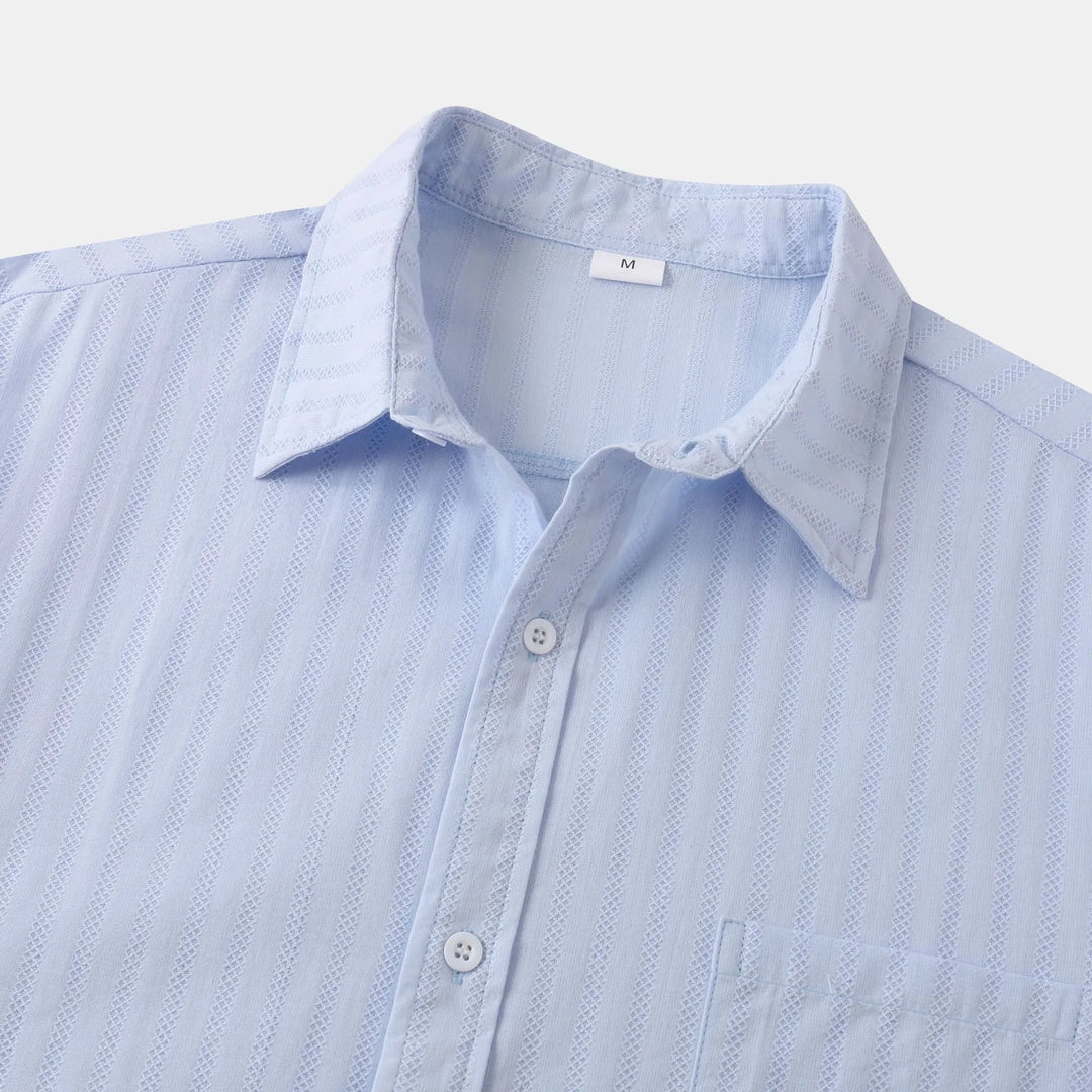 White men's short sleeve casual button-down shirt. Everyday summer fashion essential.