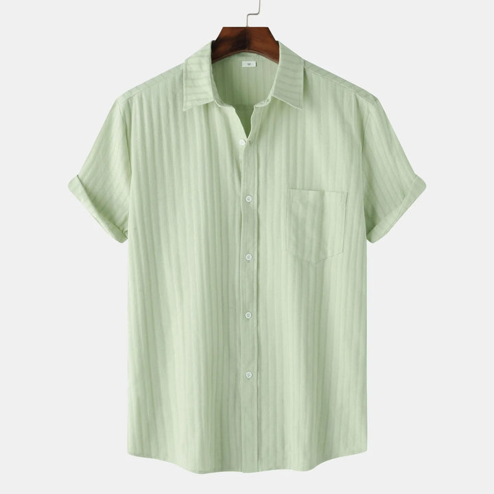 Light green men's short sleeve button-down shirt. Casual & smart for everyday wear.
