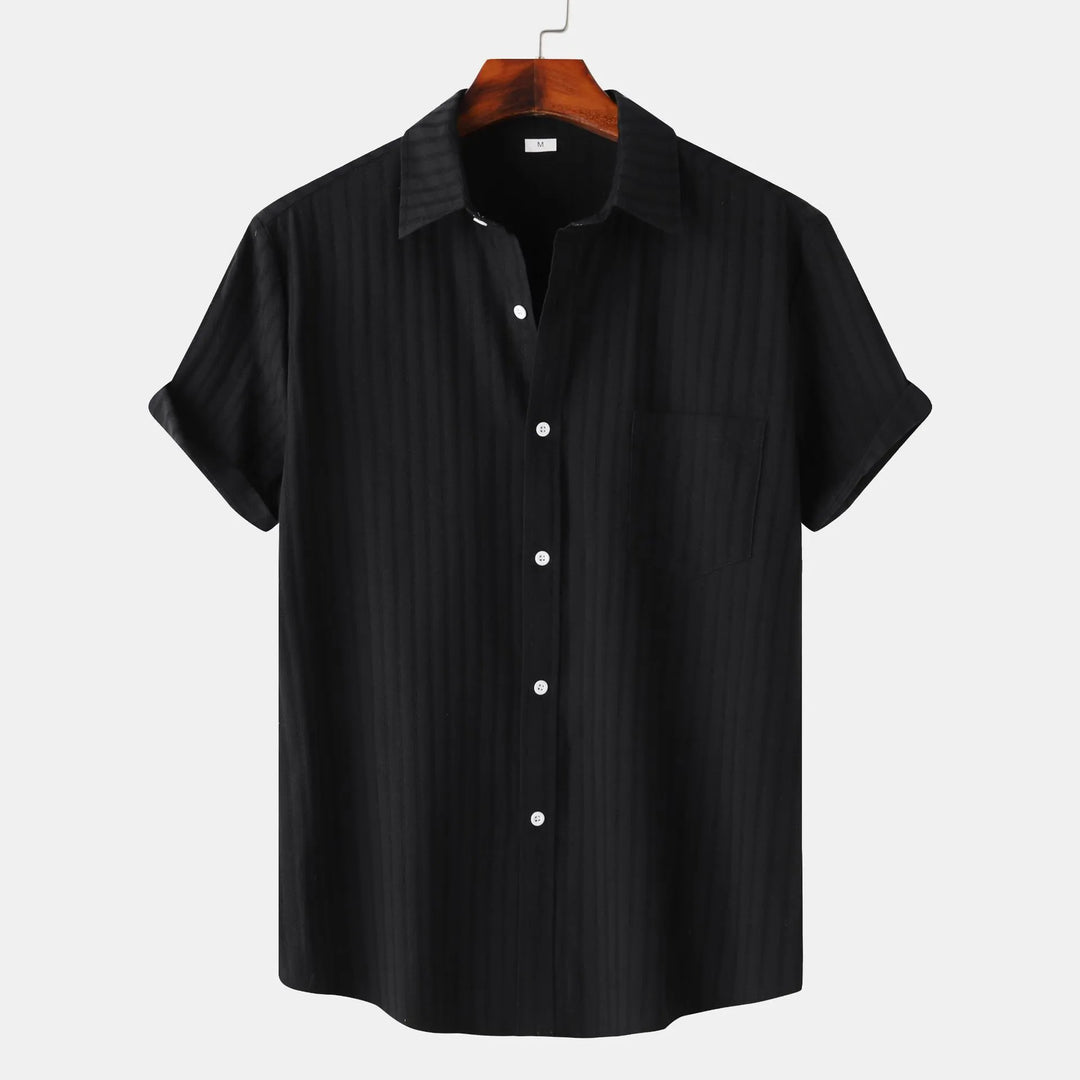 Men's casual short sleeve button-down shirt. Relaxed fit, perfect for everyday summer style.