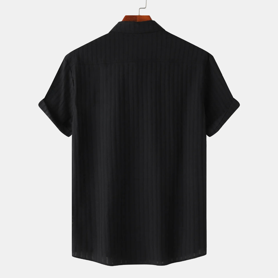 Men's smart casual short sleeve button-down shirt. Collared, versatile for various occasions.