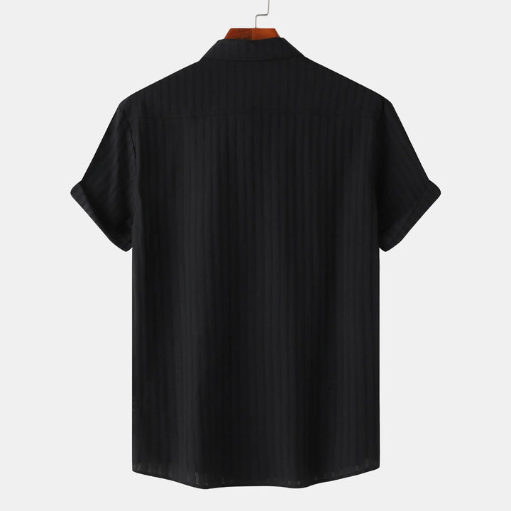 Men's smart casual short sleeve button-down shirt. Collared, versatile for various occasions.