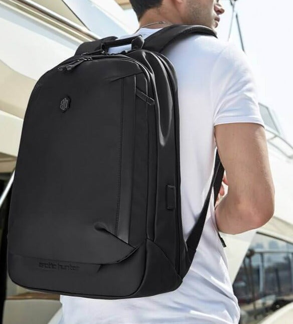 Versatile men's travel & commuter backpack. Water-resistant anti-theft design for secure daily and long trips.