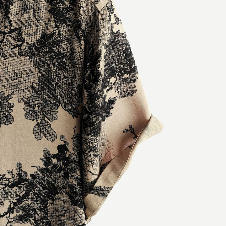 Men's AirLight Vintage Blossom short sleeve shirt with floral pattern, lightweight fabric; front view.