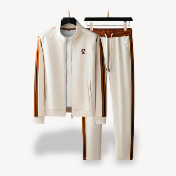 Men's beige tracksuit set with contrast stripes, featuring a slim fit, ribbed cuffs, and elastic waist, perfect for casual st