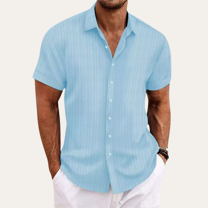 Men's blue striped cotton short-sleeve shirt, featuring a classic fit and Kent collar for a stylish, casual look.