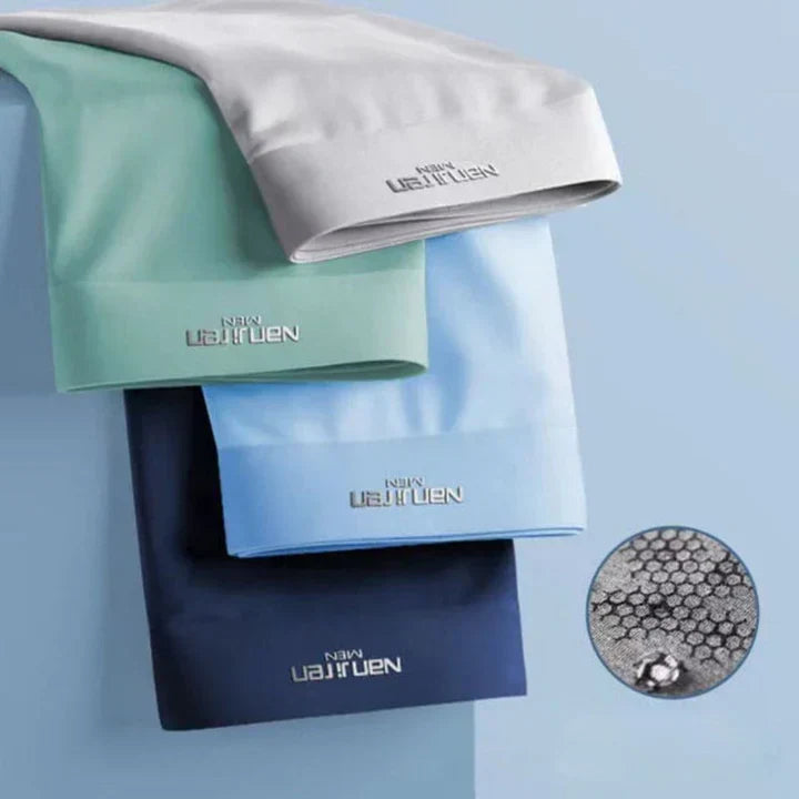 "Men's breathable boxers 4-pack, moisture-wicking, soft fabric, elastic waistband, stylish colors, comfortable fit."