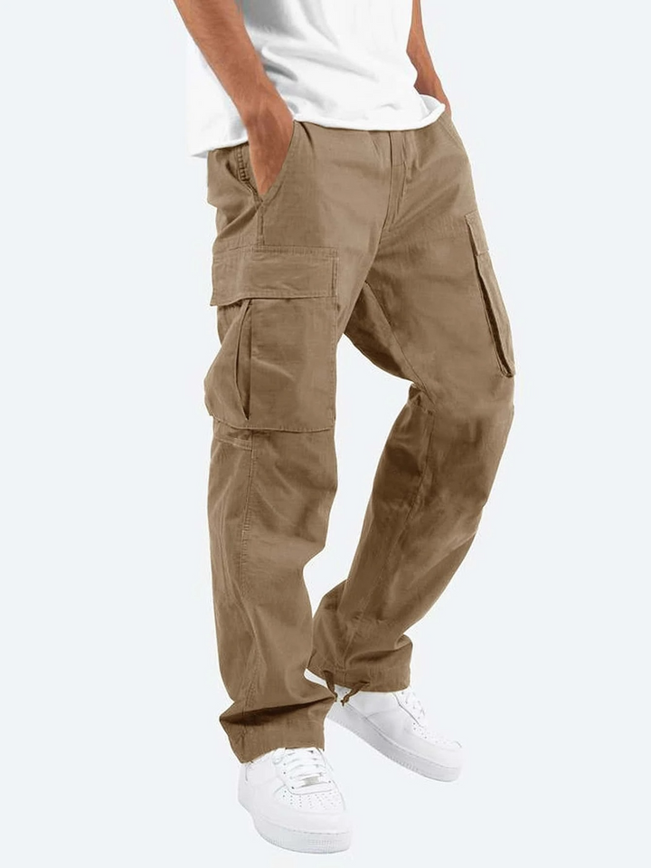 Men's cargo pants, beige, relaxed fit, multi-pocket design for style and utility; ideal for versatile, comfortable wear.