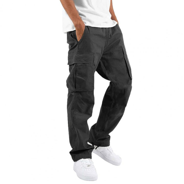 Men's cargo pants with stretch fabric, multiple pockets; comfortable fit, durable with zipper, button closure in khaki color.