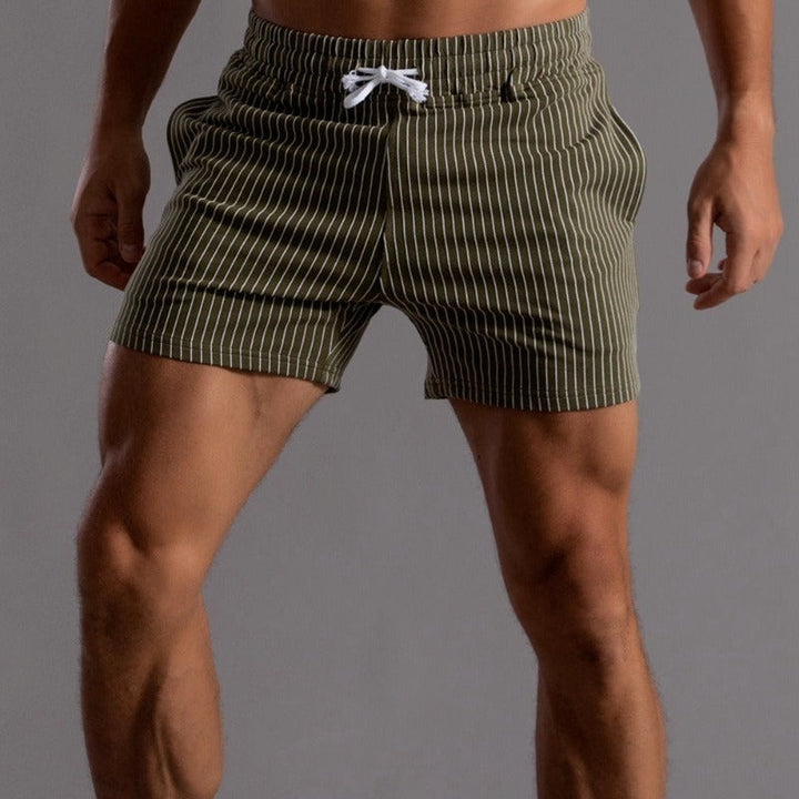 Men's casual striped shorts in green, featuring a chic striped design and comfortable elastic waistband.