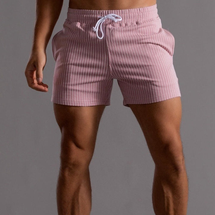 Men's casual striped shorts in pink, perfect for adding a pop of color to your summer wardrobe.