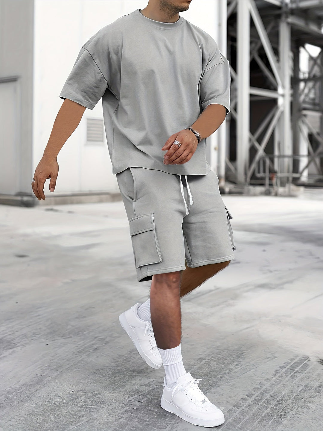 "Men's casual T-shirt & cargo shorts set, crew-neck tee, drawstring shorts, relaxed fit, functional pockets, monochrome style