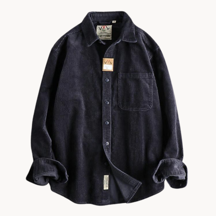 Men's classic orange corduroy shirt with button-down front and textured fabric, ideal for layering and timeless style.