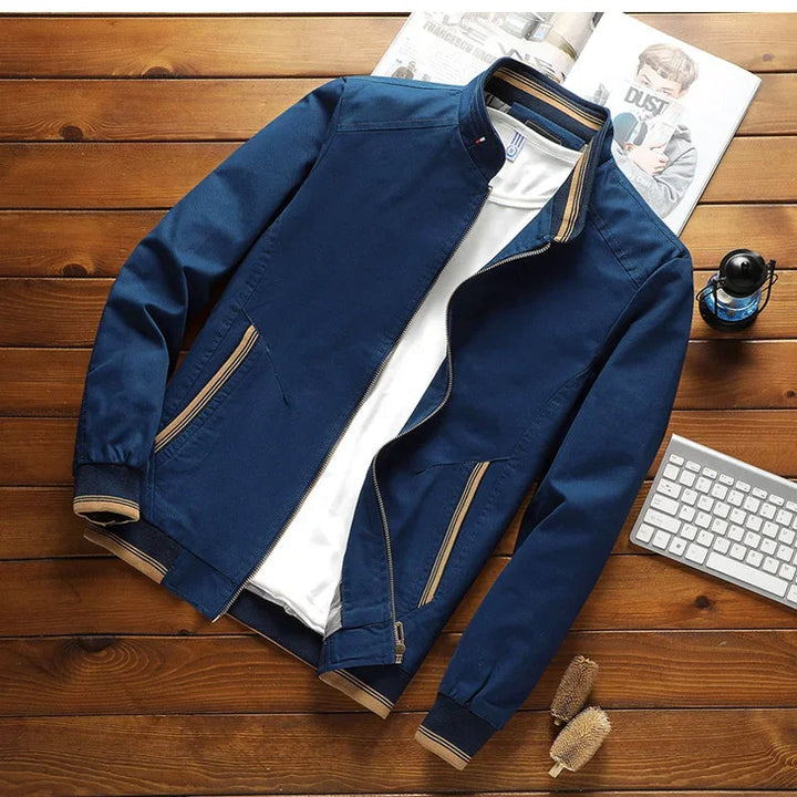 "Men's cotton bomber jacket with stand-up collar, ribbed cuffs, windproof, lightweight, perfect for spring and autumn wear."