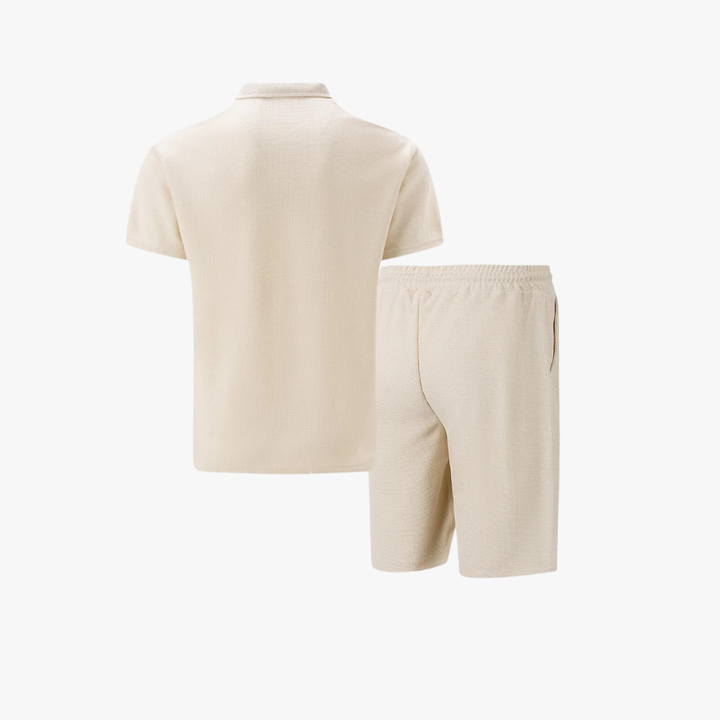 "Men's cotton co-ord set with a short-sleeved zip-neck polo and drawstring shorts, perfect for casual summer style."
