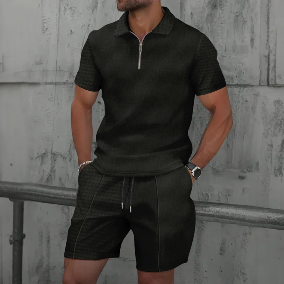 "Men's cotton co-ord set with a short-sleeved zip-neck polo and drawstring shorts, perfect for casual summer style."