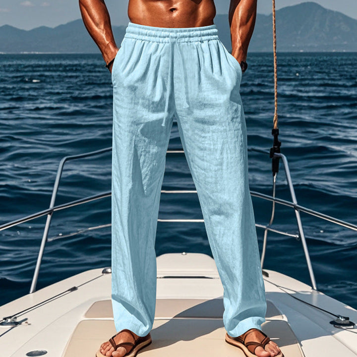 "Men's cotton linen loose trousers, breathable fabric, relaxed fit, available in Black, Grey, Khaki, Navy Blue."