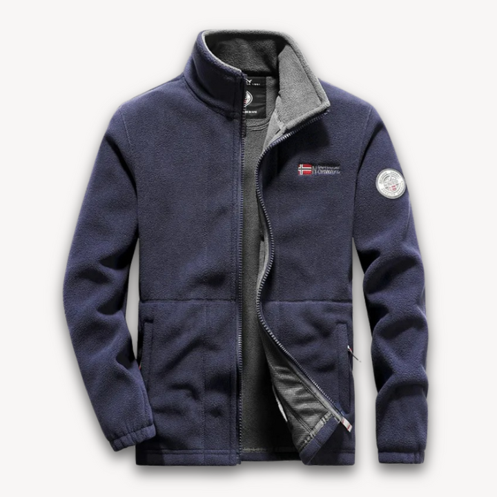 "Men's fleece jacket with full-zip front, thermal lining, in navy, side view against a white background."