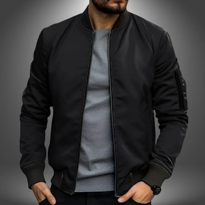 "Men's lightweight bomber jacket, casual windbreaker style with slim fit, features ribbed cuffs and arm zip pocket."