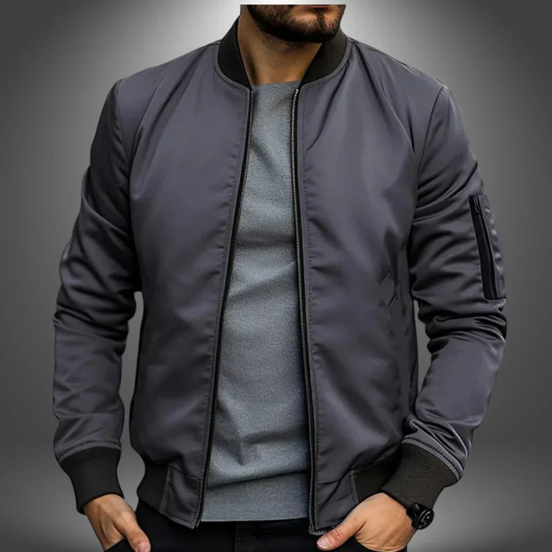 "Men's lightweight bomber jacket, casual windbreaker style with slim fit, features ribbed cuffs and arm zip pocket."
