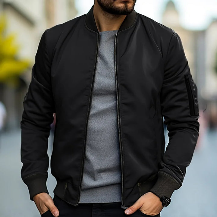 Men's lightweight bomber jacket with ribbed trim, regular fit, sleek design, versatile casual style, and breathable fabric.