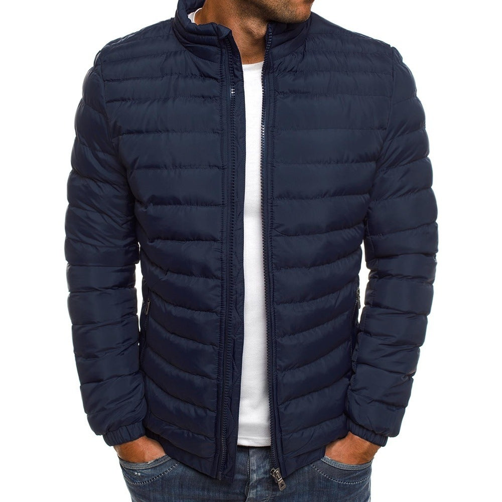Men's luxury down puffer jacket, navy with stand collar, offering stylish warmth and tailored fit for winter fashion.