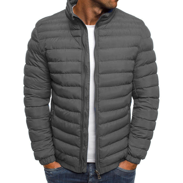 Men's luxury down puffer jacket, navy with stand collar, offering stylish warmth and tailored fit for winter fashion.