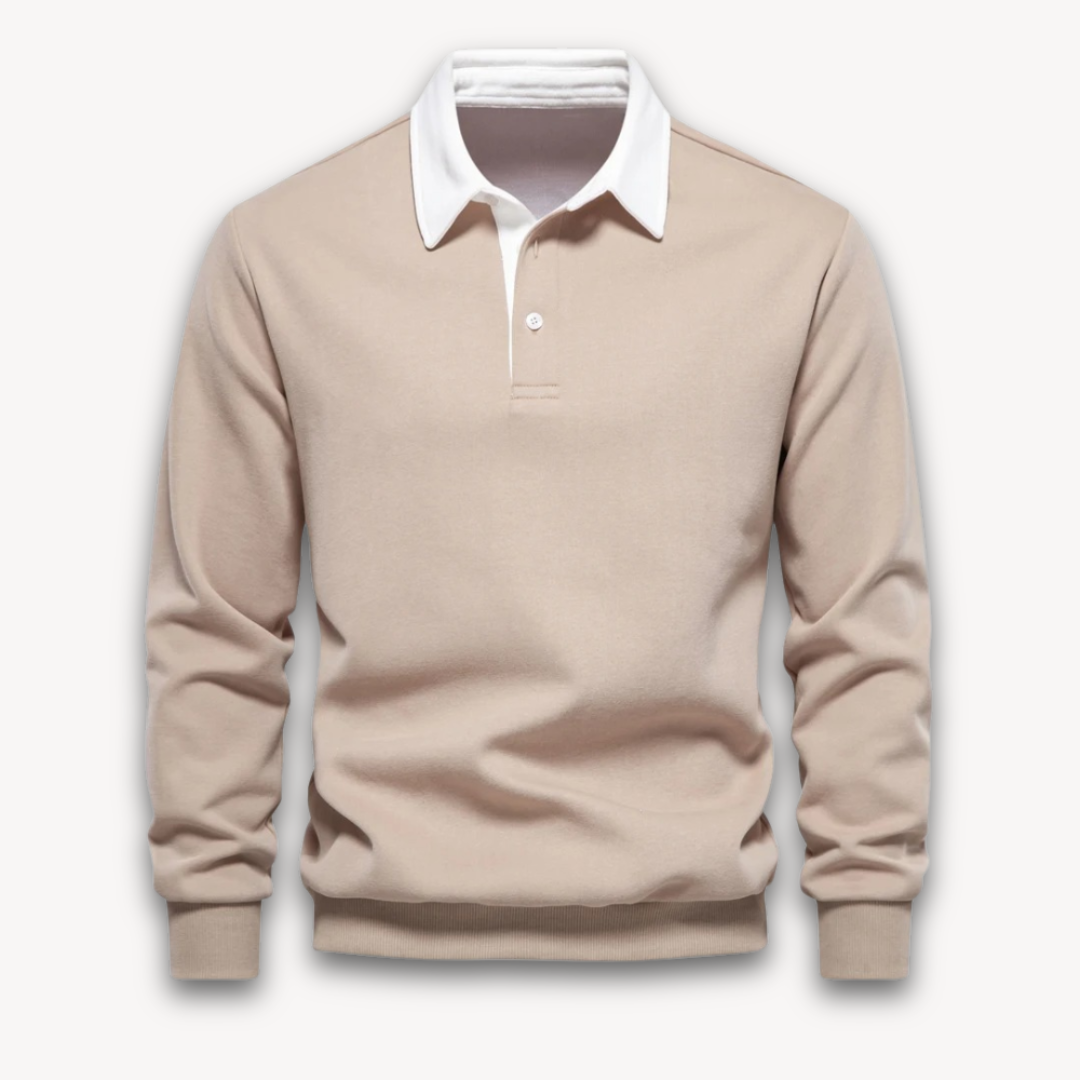 "Men's navy cotton long-sleeve polo sweater with classic design and contrasting collar, perfect for casual or formal wear."