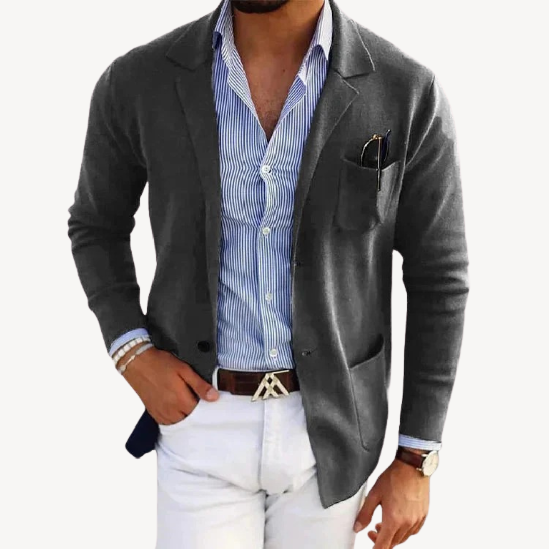 "Men's navy slim fit cotton blend blazer with notched lapel shown front view, perfect for casual and smart occasions."