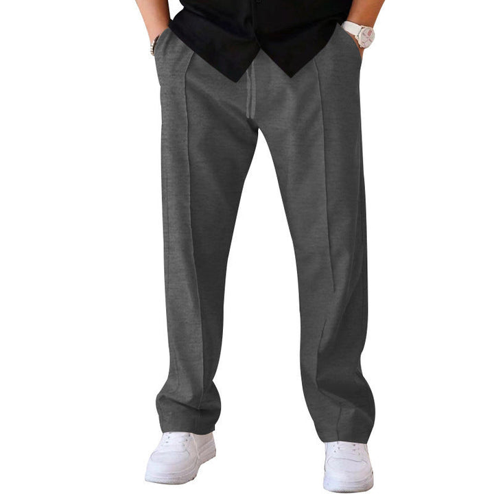 "Men's relaxed linen trousers, wide-leg, breathable, versatile colors like beige, black, blue; perfect comfort and style"