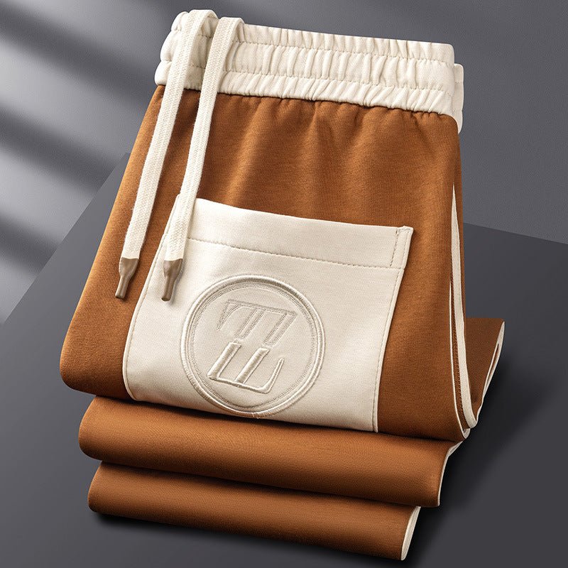 "Men's sporty tracksuit set lycra fabric, sleek lines, stripe accents, tailored fit, showcasing athletic physique."