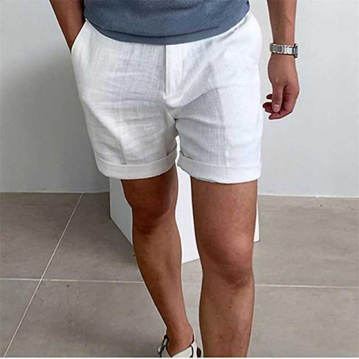 Men's vintage linen beach shorts, breathable and stylish in neutral tones, ideal for summer comfort and casual wear.