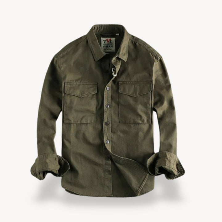 "Men's washed cotton cargo work shirt with pockets, in classic blue, featuring two chest pockets and durable stitching."