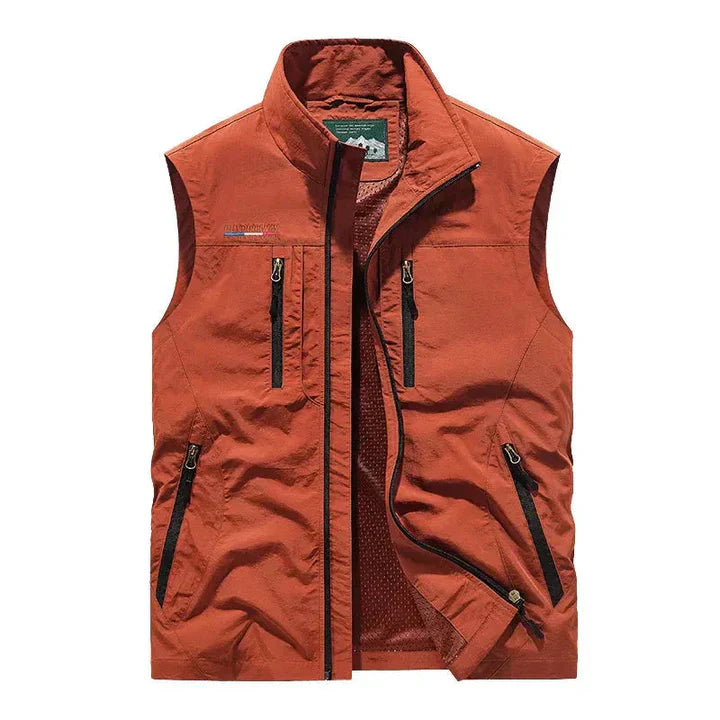 Men's waterproof insulated bodywarmer, sleek with multiple zip pockets; ideal for outdoor adventures in rain or chilly weathe