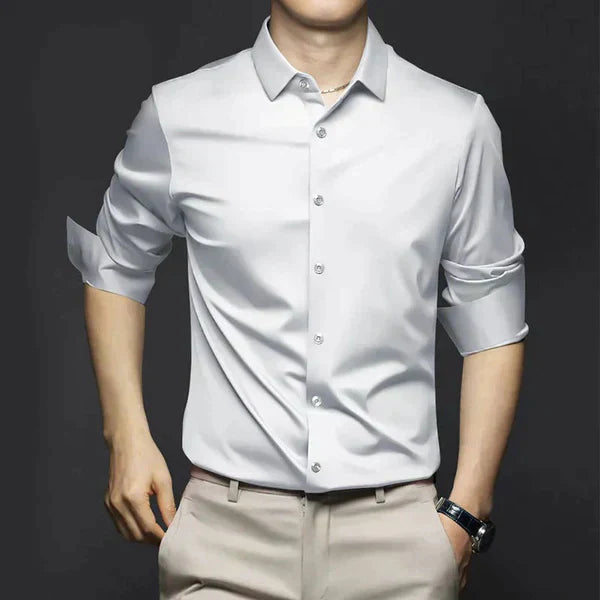 "Men's wrinkle-free dress shirt in beige. Stylish, tailored fit perfect for formal and casual settings."