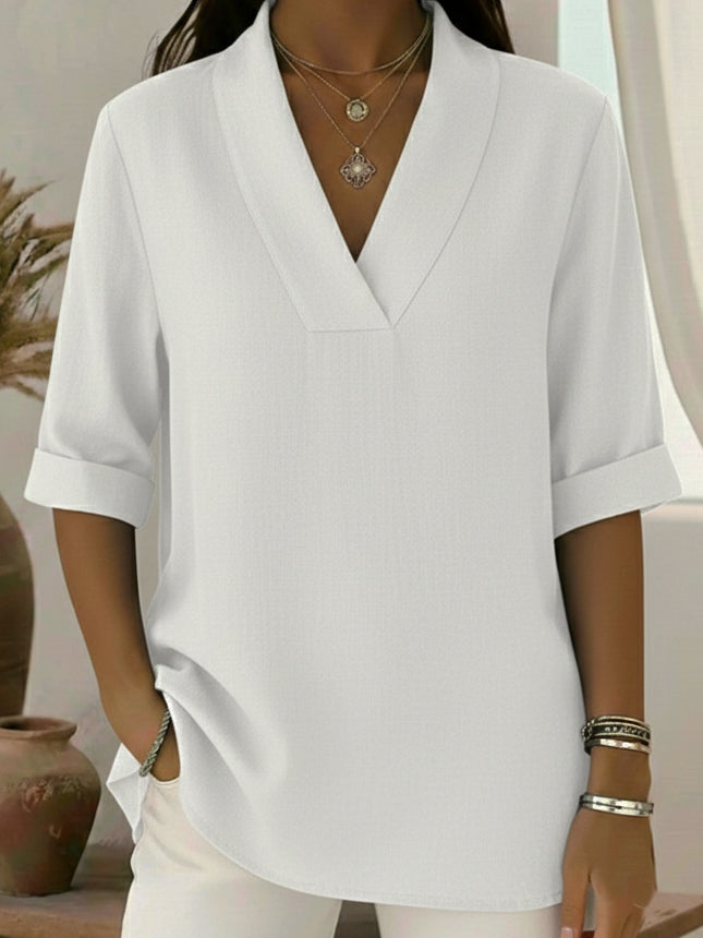 Elegant women's V-neck tunic top with roll sleeves. A versatile, breathable blouse for effortless everyday style.