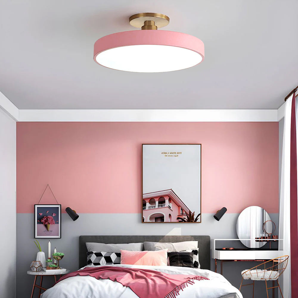 "Minimalist LED ceiling light, semi-flush design, brightens spaces with elegant style and energy-efficient glow."