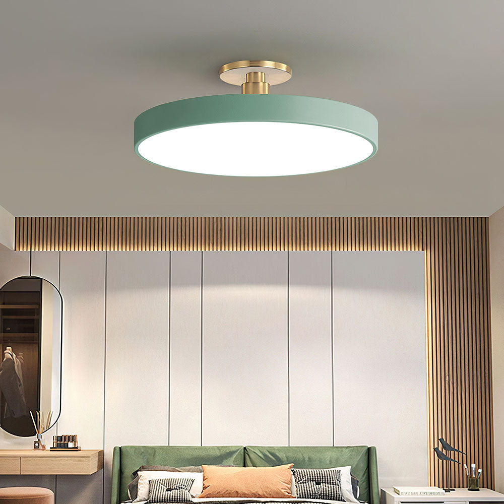 "Minimalist LED ceiling light, semi-flush design, brightens spaces with elegant style and energy-efficient glow."