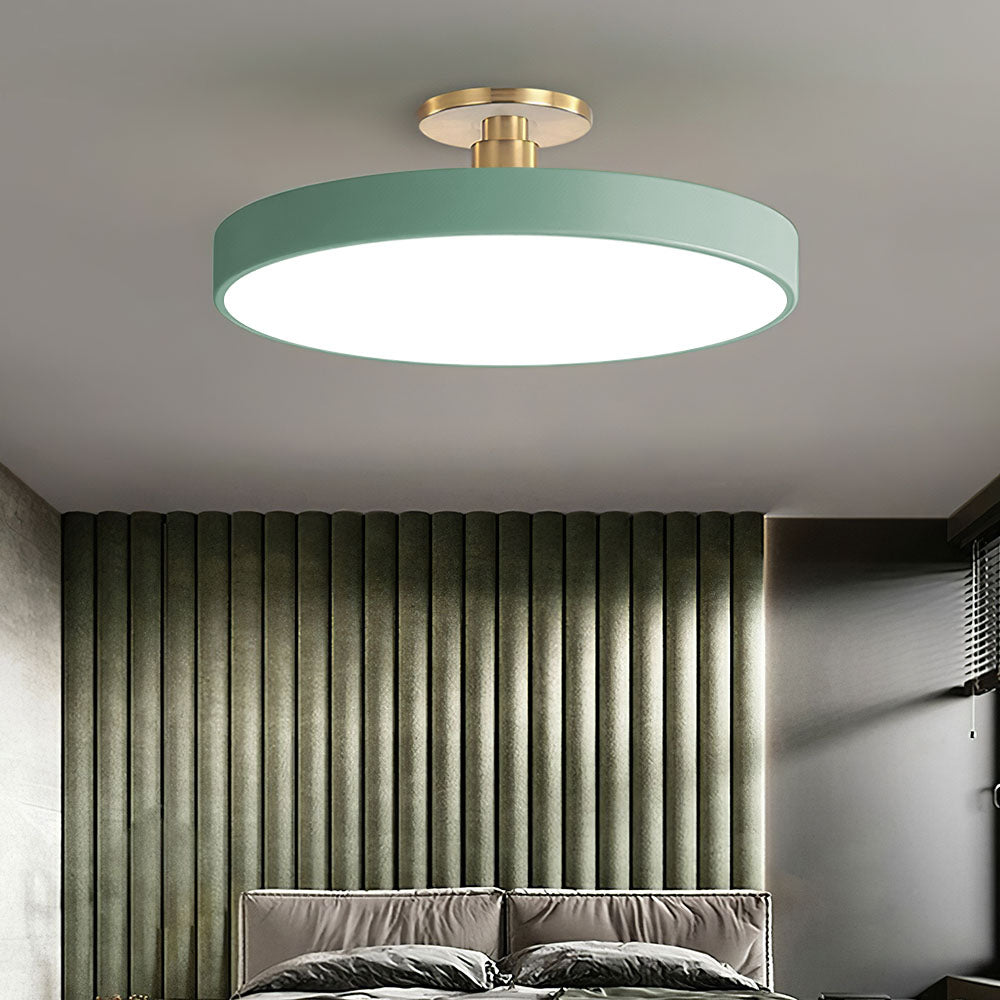 "Minimalist LED ceiling light, semi-flush design, brightens spaces with elegant style and energy-efficient glow."