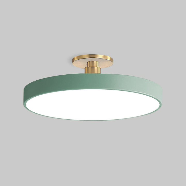 "Minimalist LED ceiling light, semi-flush design, brightens spaces with elegant style and energy-efficient glow."