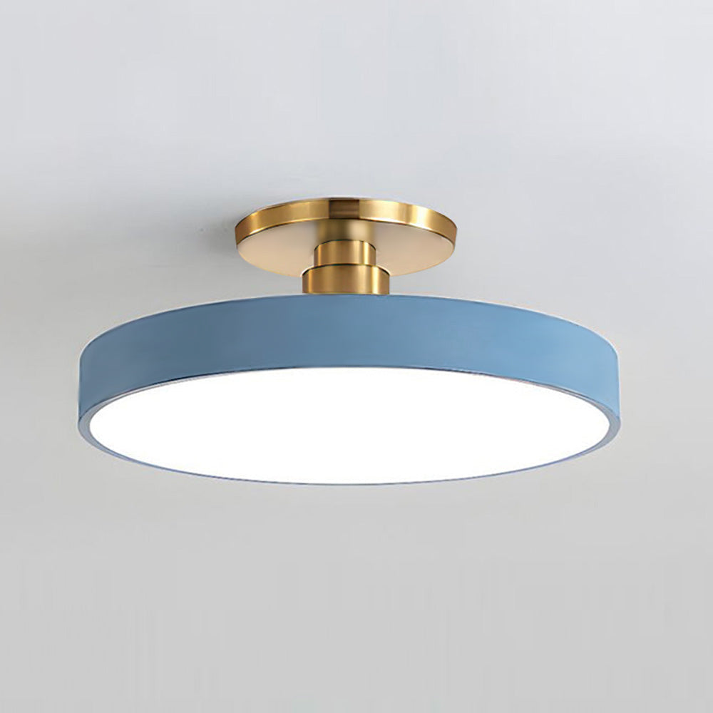 "Minimalist LED ceiling light, semi-flush design, brightens spaces with elegant style and energy-efficient glow."