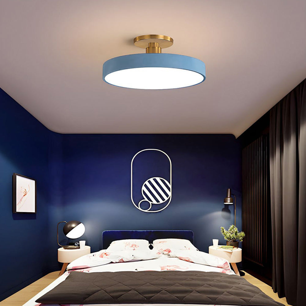 "Minimalist LED ceiling light, semi-flush design, brightens spaces with elegant style and energy-efficient glow."