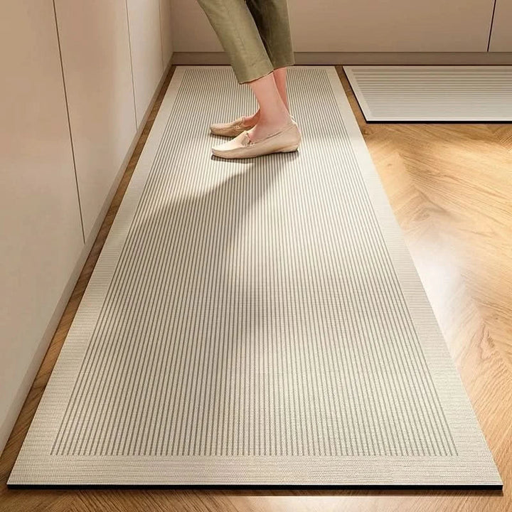 Minimalist non-slip kitchen mat offers anti-fatigue comfort & safety. Perfect floor mat for modern kitchens.