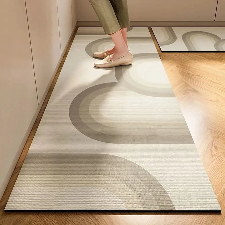 Unisex minimalist kitchen mat offers non-slip safety & anti-fatigue comfort. Durable, washable floor mat for any kitchen.
