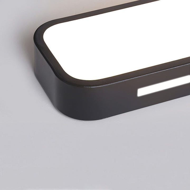 "Minimalist Nordic long LED ceiling light with sleek black finish and modern design for elegant interior lighting"